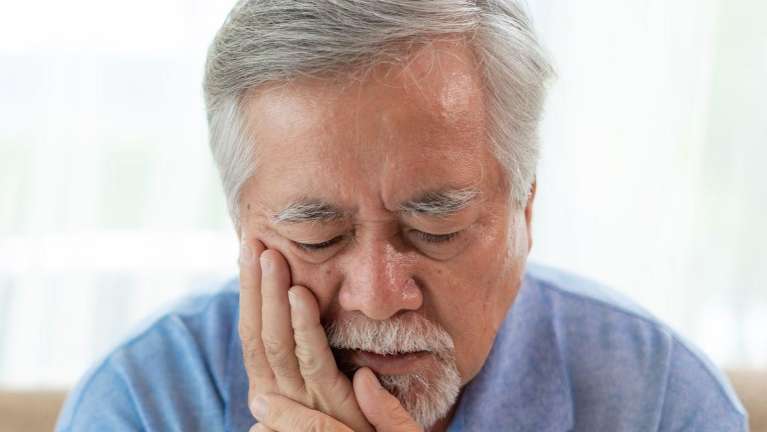 A Man Suffering a Tooth Pain