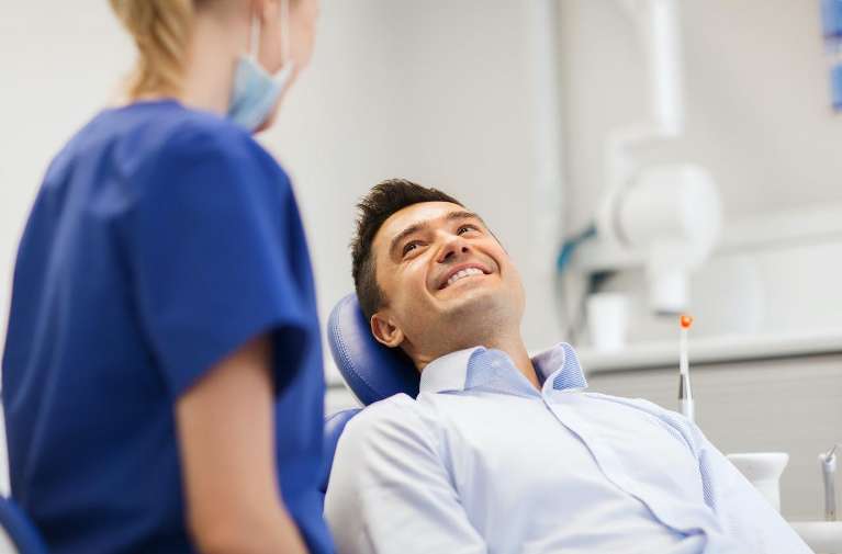 A patient waiting to get tooth extraction in Clayton, NC