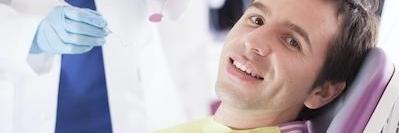 man getting teeth cleaned in clayton nc